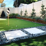 Corten steel edged putting green in backyard